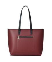 Burgundy tote bag with a long handle