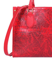 Crimson crocodile handbag for travel