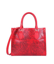 Crimson crocodile handbag for travel